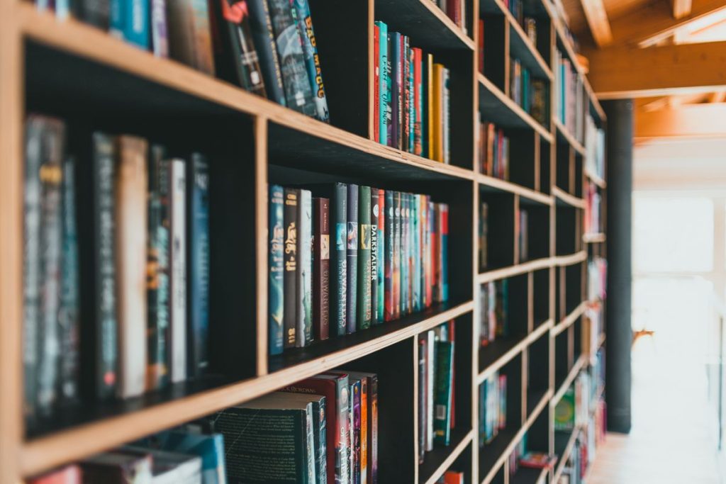 Rows of tall bookshelves in a library