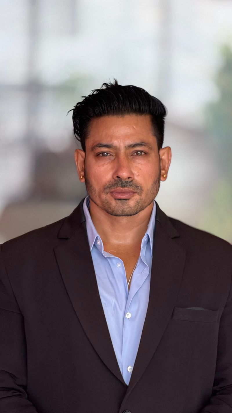 Rohan Verma, Head of Financial Planning, in a business portrait
