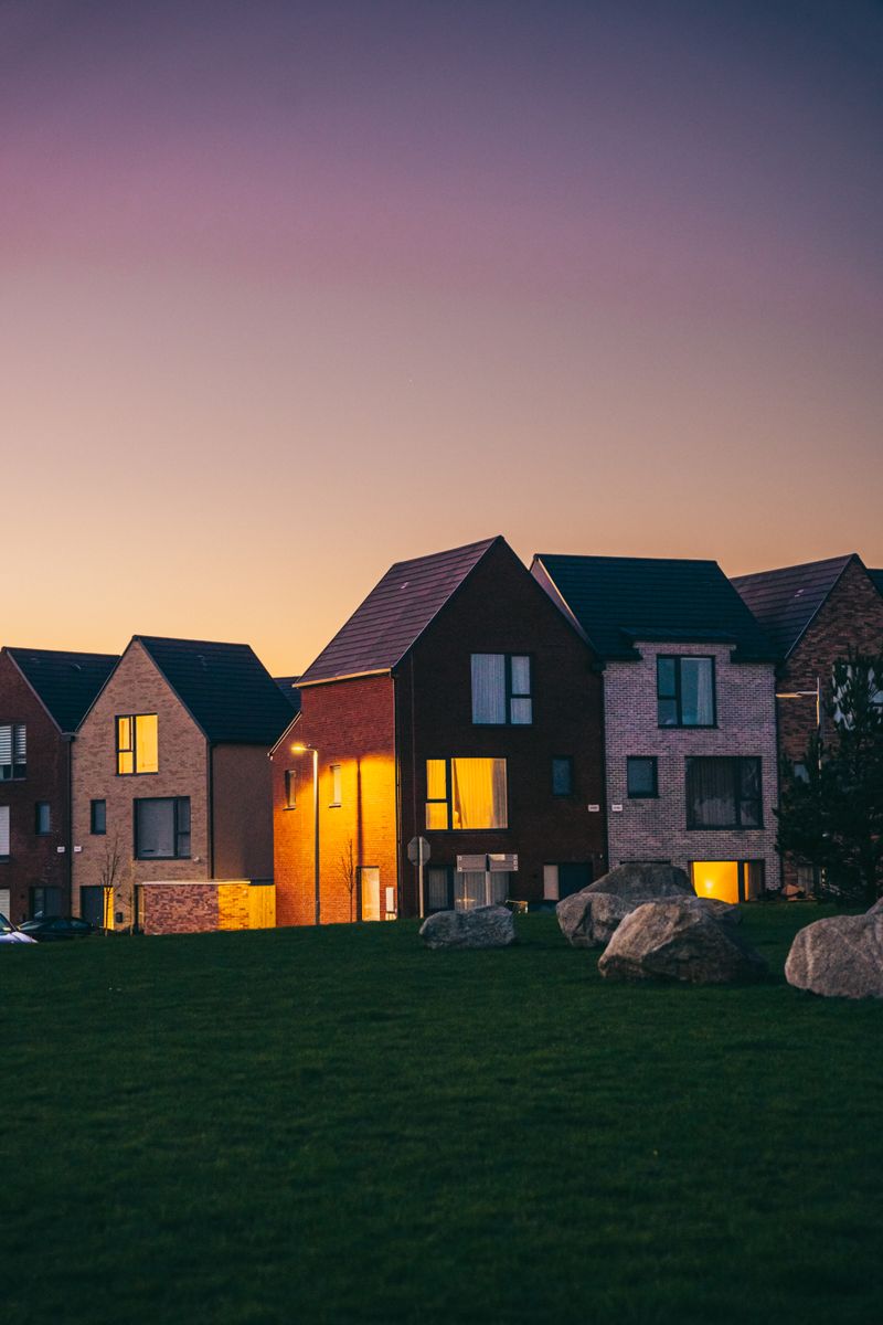 Colourful townhouses glowing at dusk