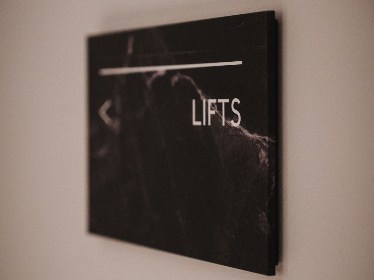 Palmwood minimalist wayfinding signage