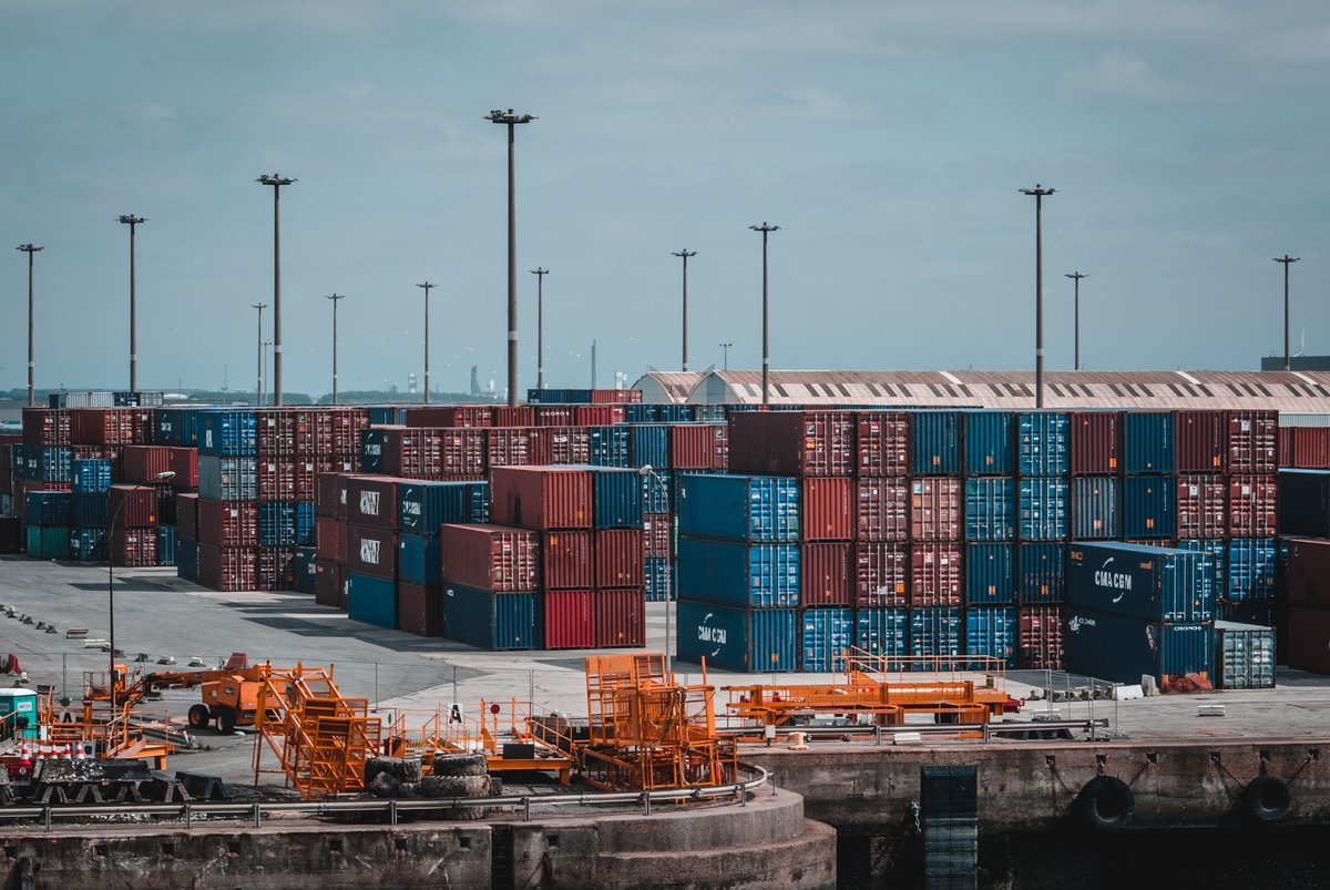 Shipping containers stacked at a freight terminal