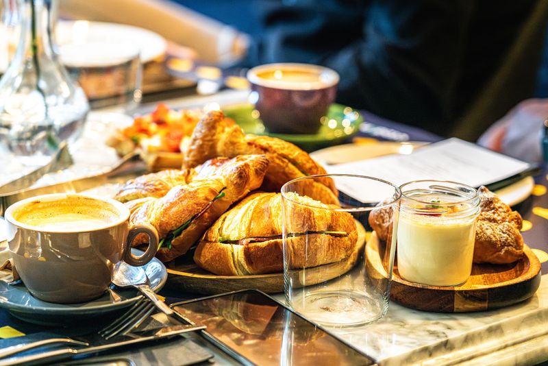Croissants and coffee on a breakfast table